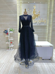 A vintage-inspired double-cloche dress with a flattering silhouette, ideal for a special occasion